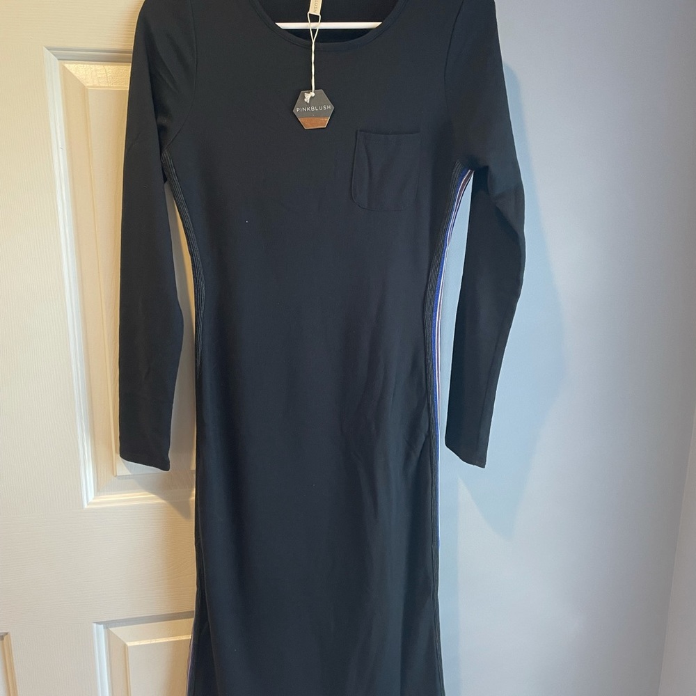Black long sleeve maternity dress.